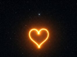 Heart-shaped light under starry sky.